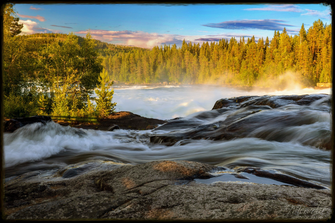 Landscape photography at Storforsen, Sweden, using long exposure to create silky water on a summer day.