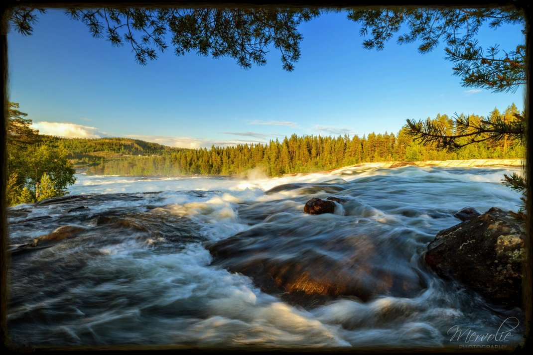 Landscape photography at Storforsen, Sweden, using long exposure to create silky water on a summer day.