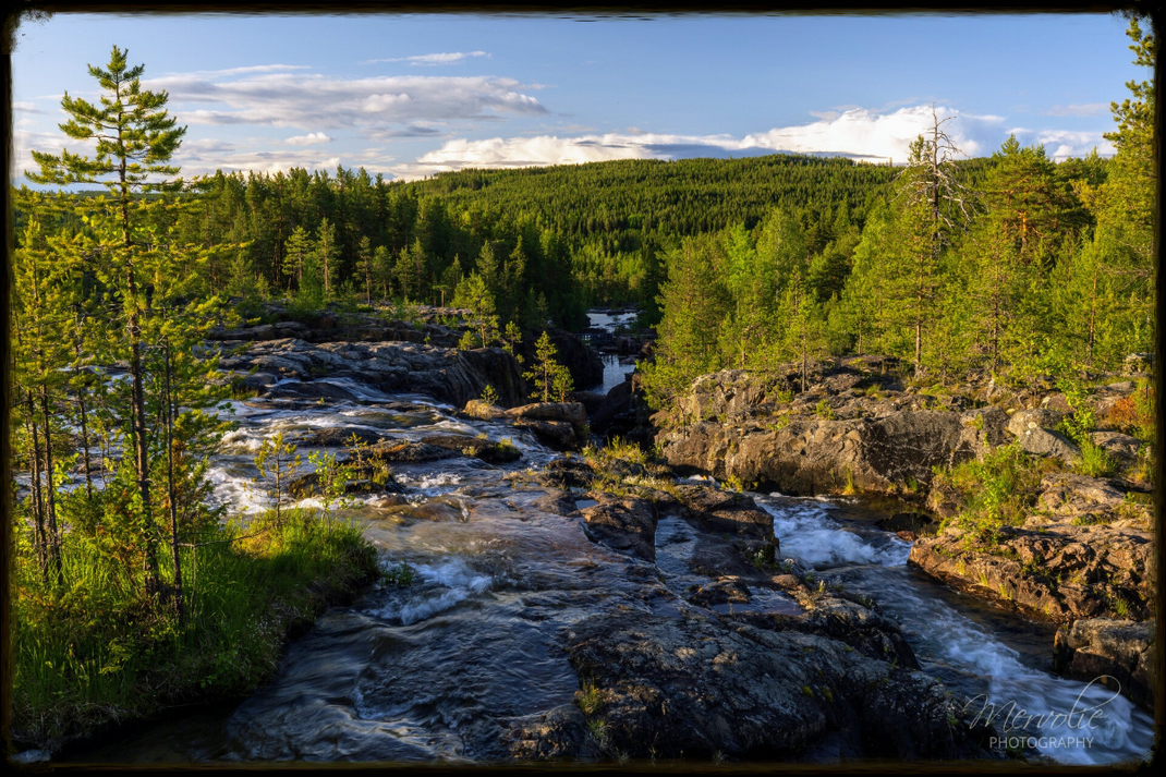 Landscape photography at Storforsen, Sweden, using long exposure to create silky water on a summer day.