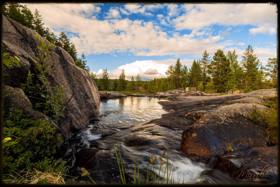 Landscape photography at Storforsen, Sweden, using long exposure to create silky water on a summer day.