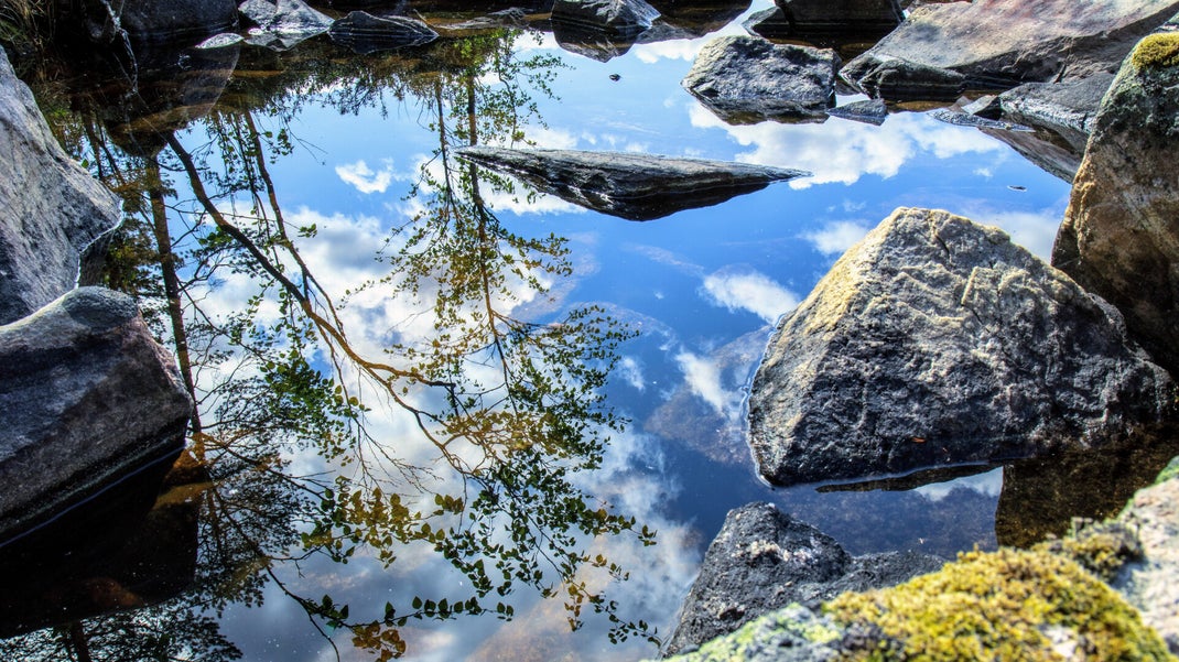 The water mirrors the sky in Finland