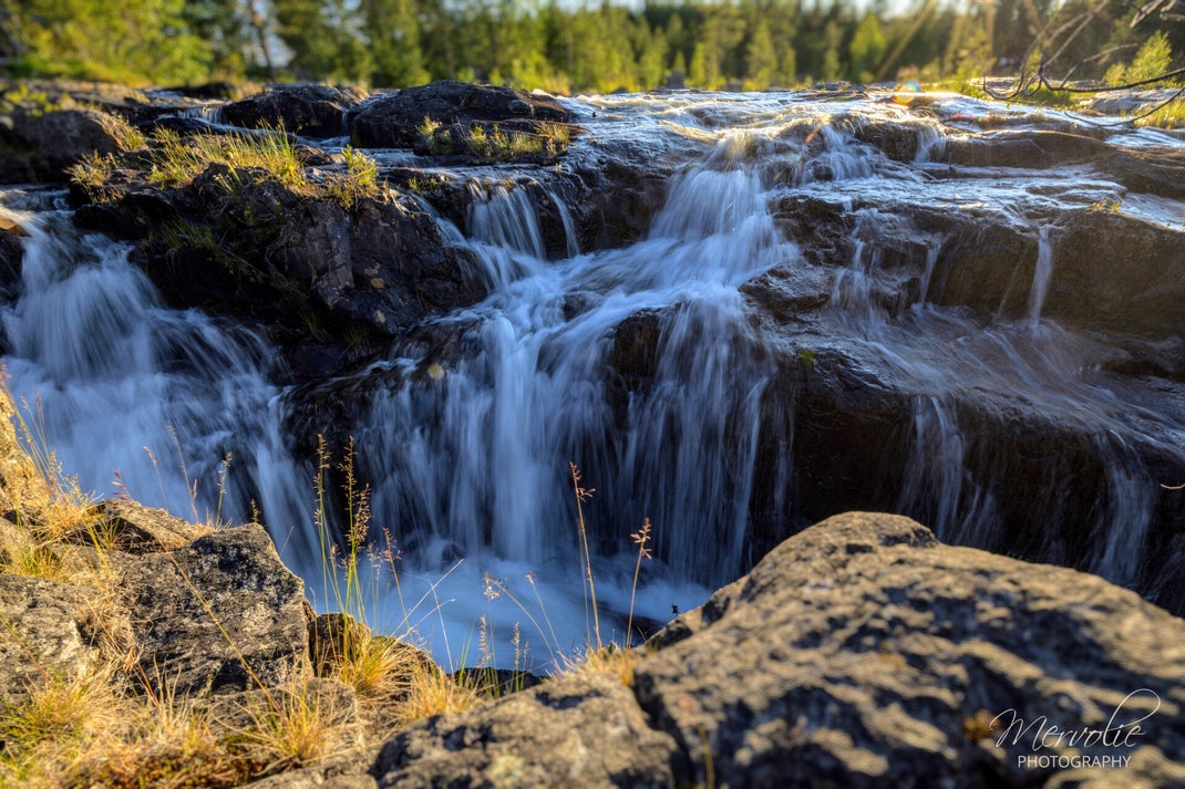 Landscape photography at Storforsen, Sweden, using long exposure to create silky water on a summer day.