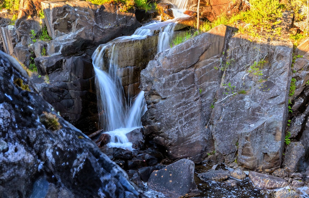 Landscape photography at Storforsen, Sweden, using long exposure to create silky water on a summer day.