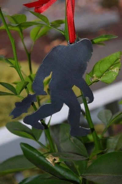 Bigfoot Sasquatch Metal Ornament with Fish