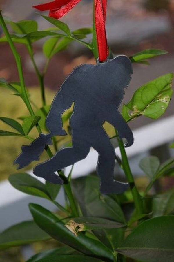 Bigfoot Sasquatch Metal Ornament with Fish