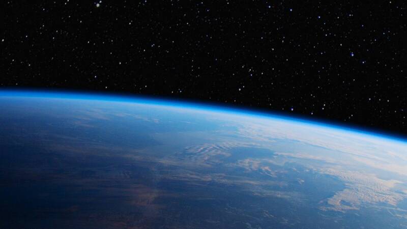 Earth atmosphere viewed from space showing Earth's protection against cosmic radiation