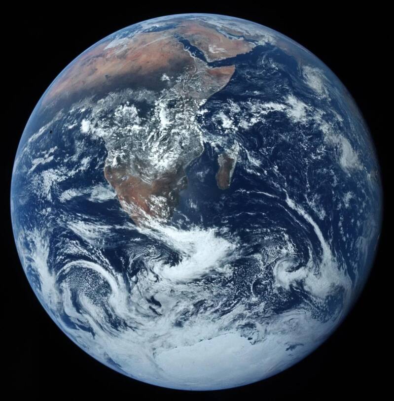 Earth viewed from space, protected within the Solar System.