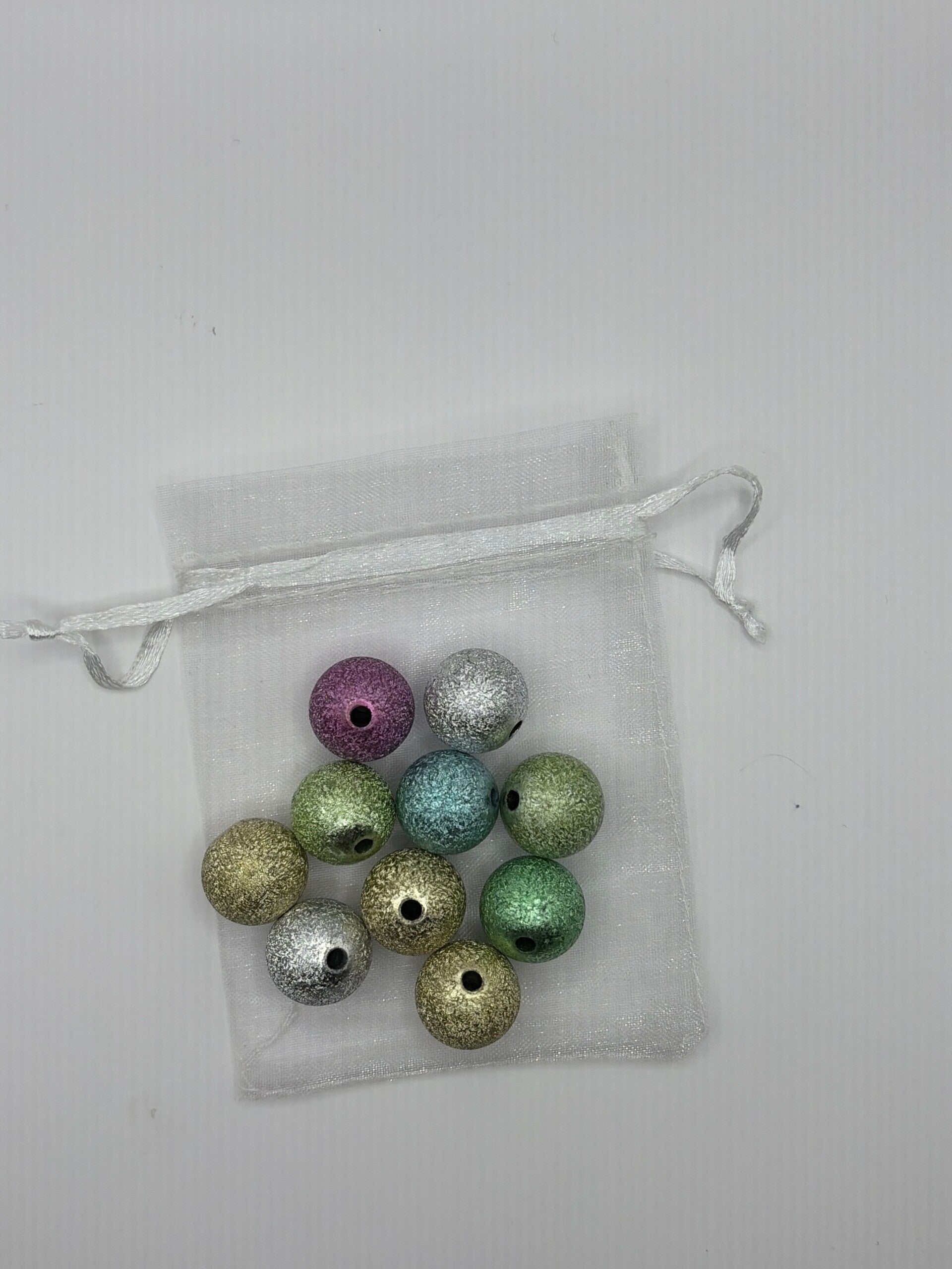 Glitterkralen 16 mm gemend, zakje 10 stuks