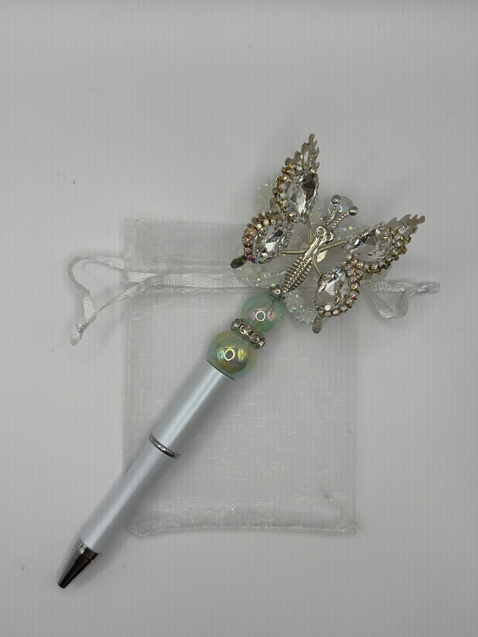 Pen parelmoer met bewegende vlinder