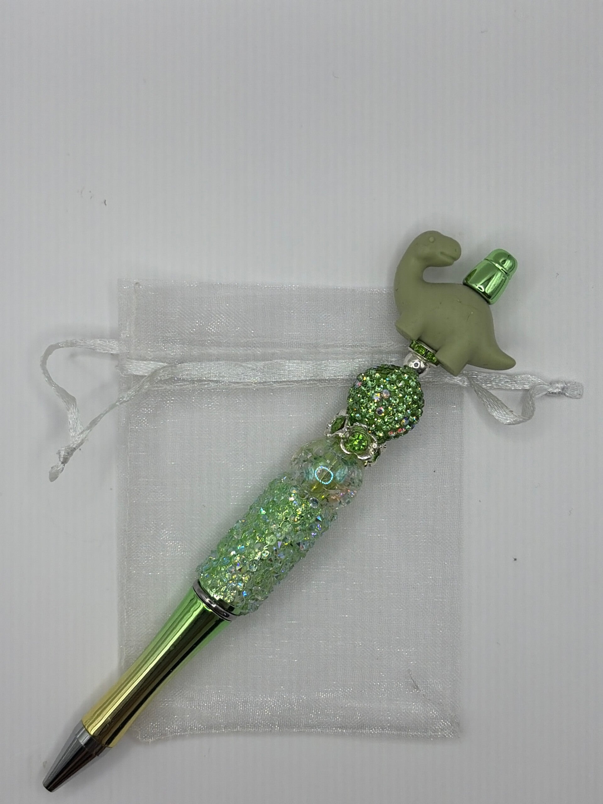 Pen groen met goudverloop met groene dino