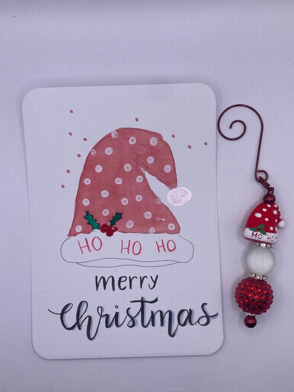 Kerstkaart met Kersthanger muts (rood)