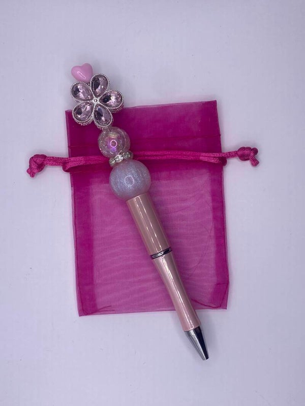 Pen met roze fancy bloem