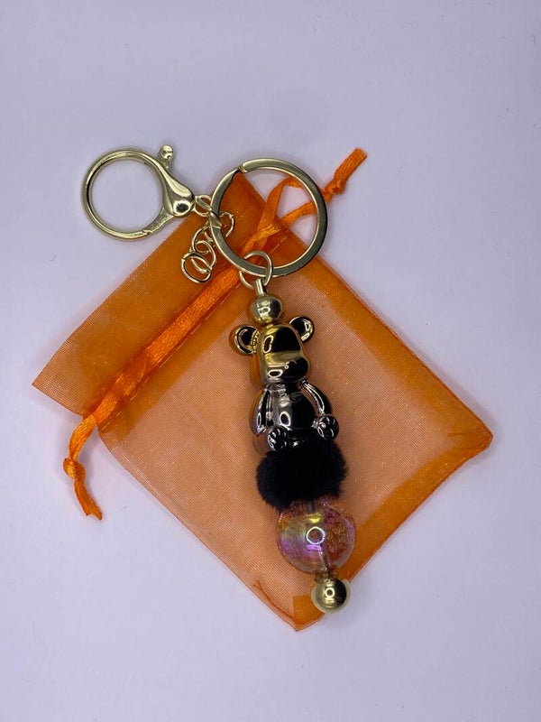 Sleutelhanger goudkleurig met metallic beer goud titanium