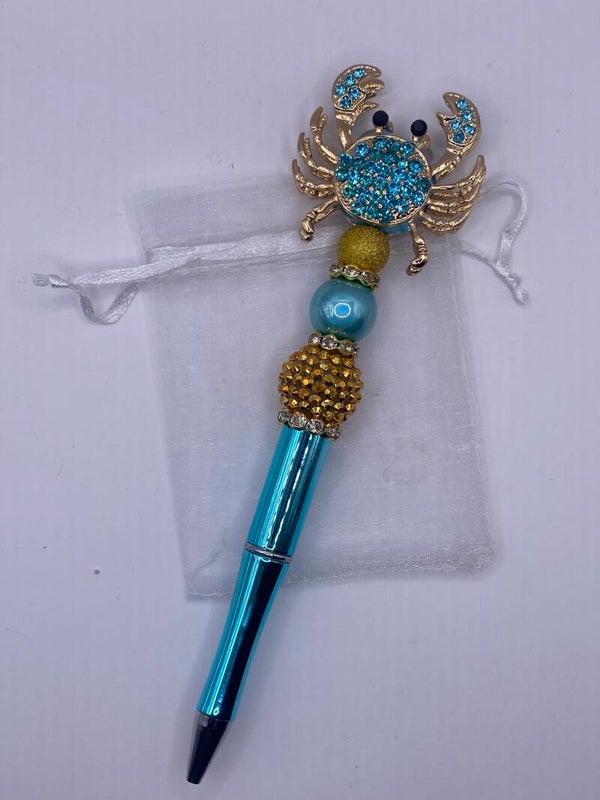 Pen met fancy Strass krab goud turqoise