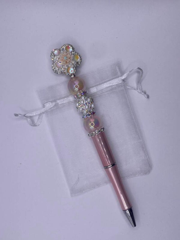 Pen parelmoer roze met zilver bloem