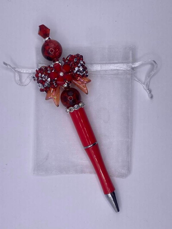Pen met rode strik