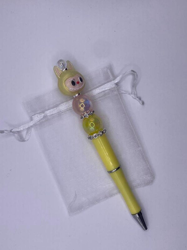 Pen Labubu gele pen en geel poppetje