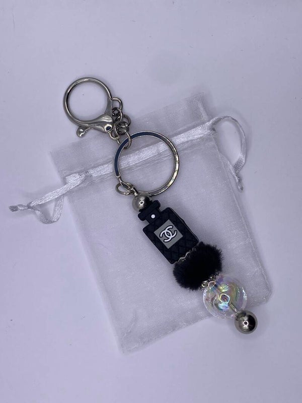 Sleutelhanger zilverkleurig CC parfumflesje