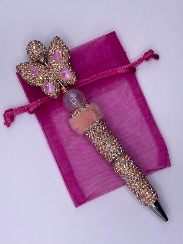 Rhinestone pen zalm met vlinder glitter