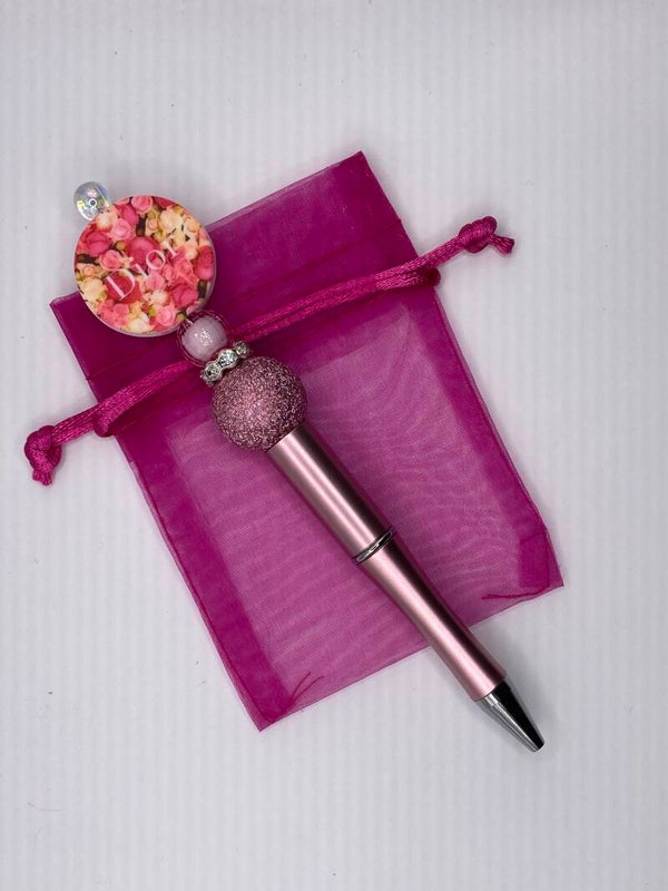 Pen Dior gebloemd rond logo