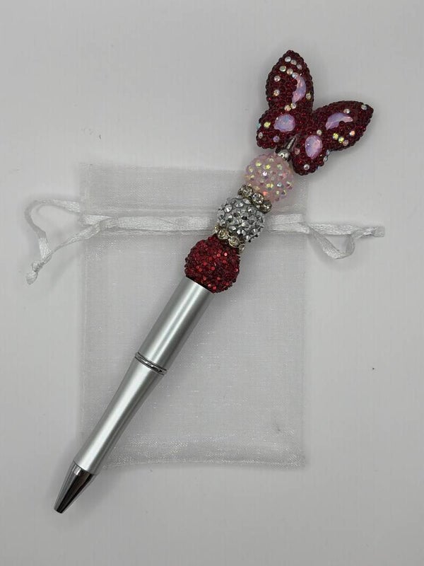Pen zilverkleurig met rode glitter vlinder