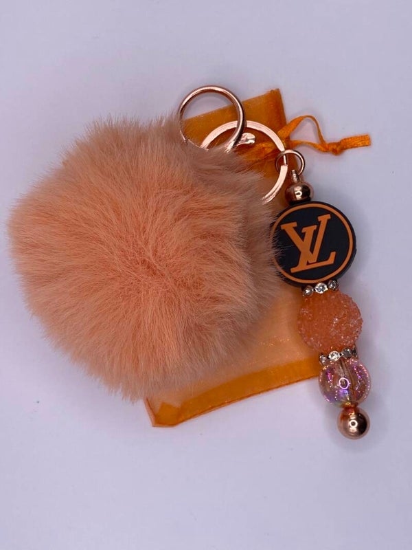 Sleutelhanger / tashanger LV logo rond met pompom