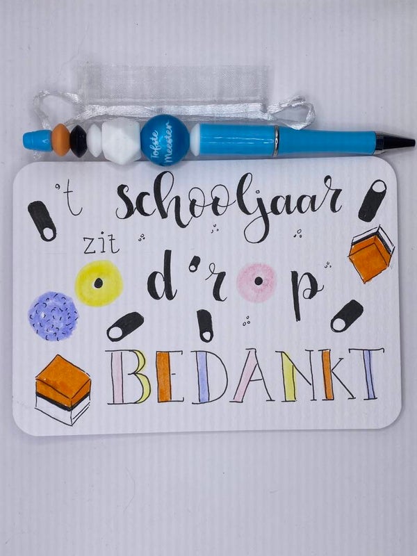 Kaart + pen Schooljaar zit d’rop