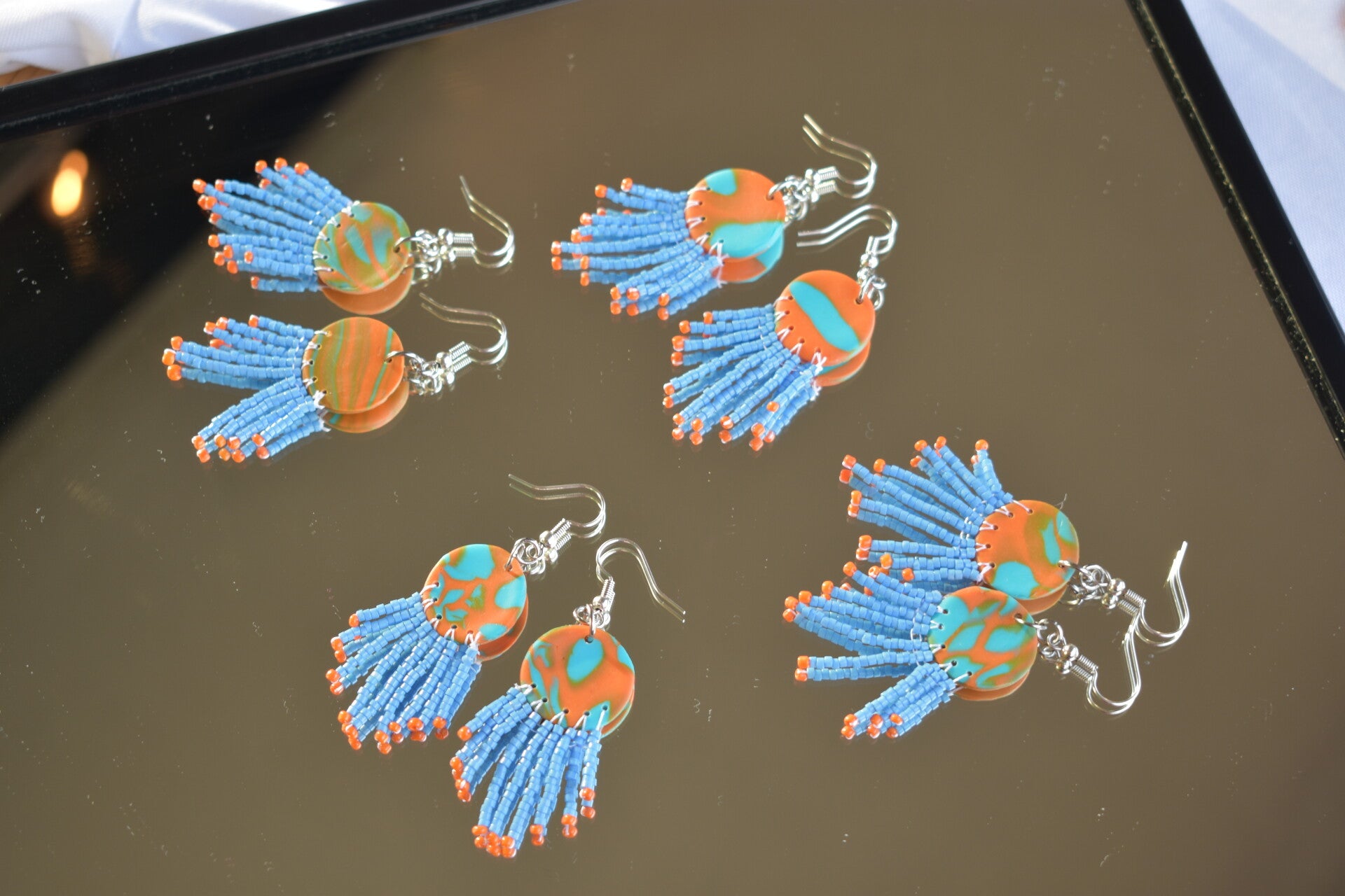 Blue and Orange Beaded Circle Earrings