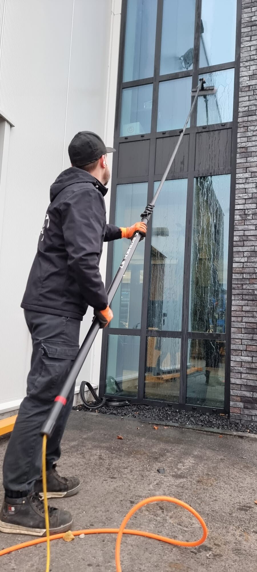 Glasbewassing hoog met telescoopsteel