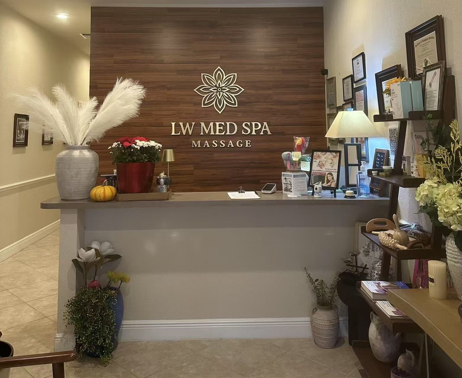 LW Med Spa Massage reception area in St. Cloud Florida, a clean and calming massage and lymphatic drainage studio serving Lake Nona and Kissimmee clients.