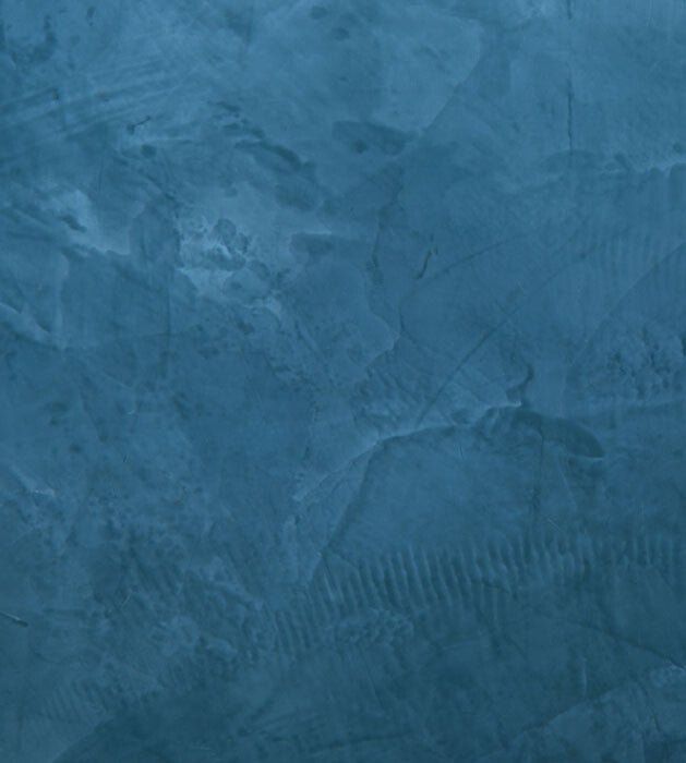 close up of a rich royal blue venetian plaster finish