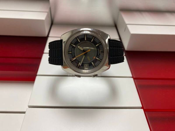 Montre vintage omege alarme