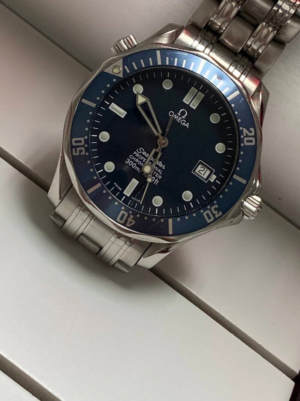 Montre OMEGA BOITE ET PAPIERS