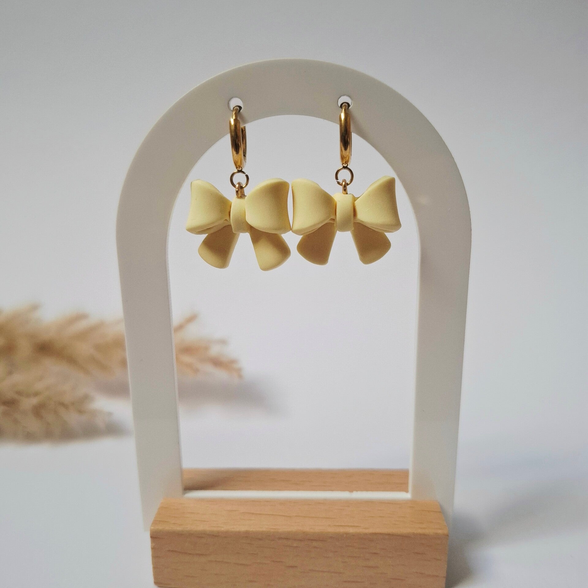Hanger - Strikjes Geel