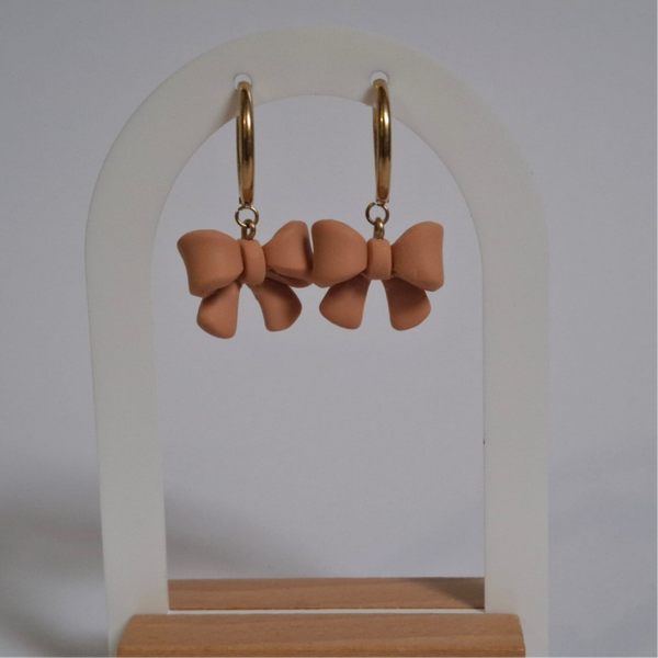 Hanger - Strikjes Oranje-Bruin