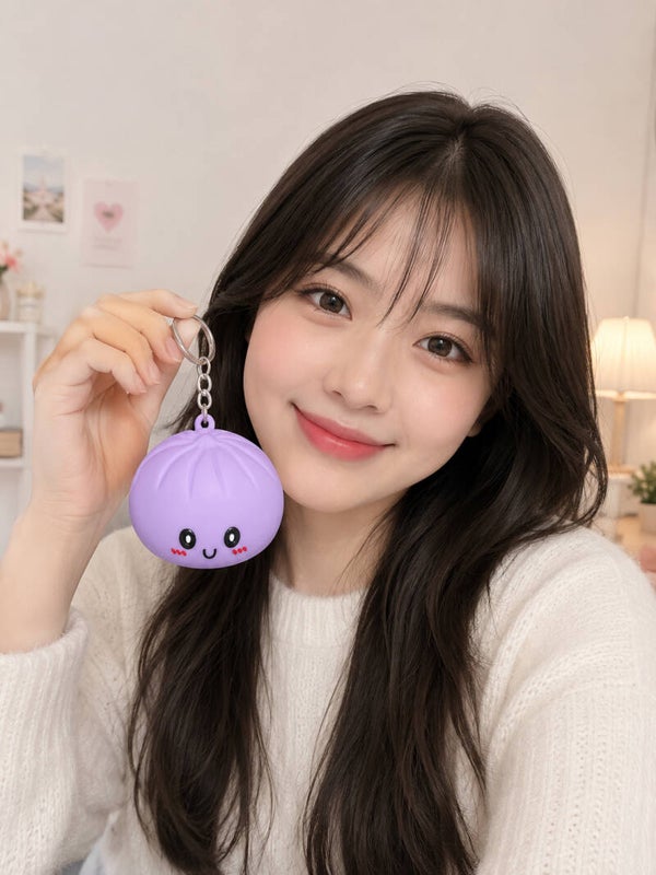 FEELZiES LIGHT UP DUMPLING SQUISHY KEYCHAIN + BAG CHARM PURPLE