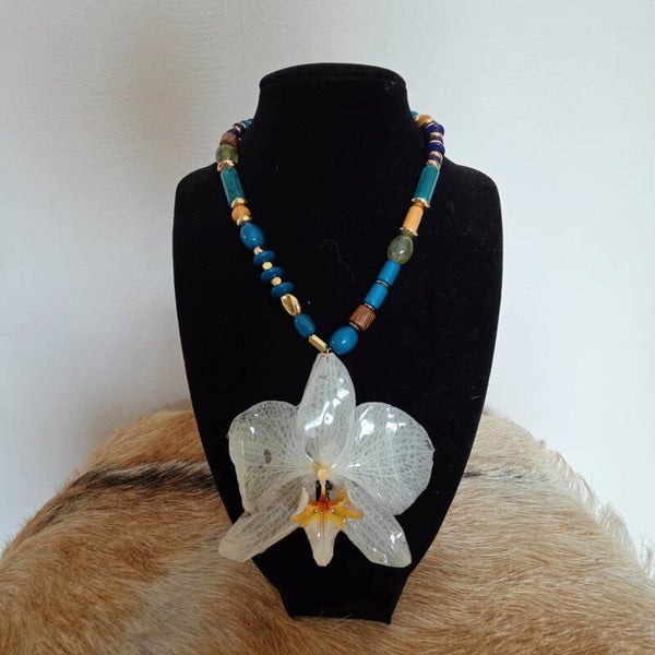 White large orchid blue stone