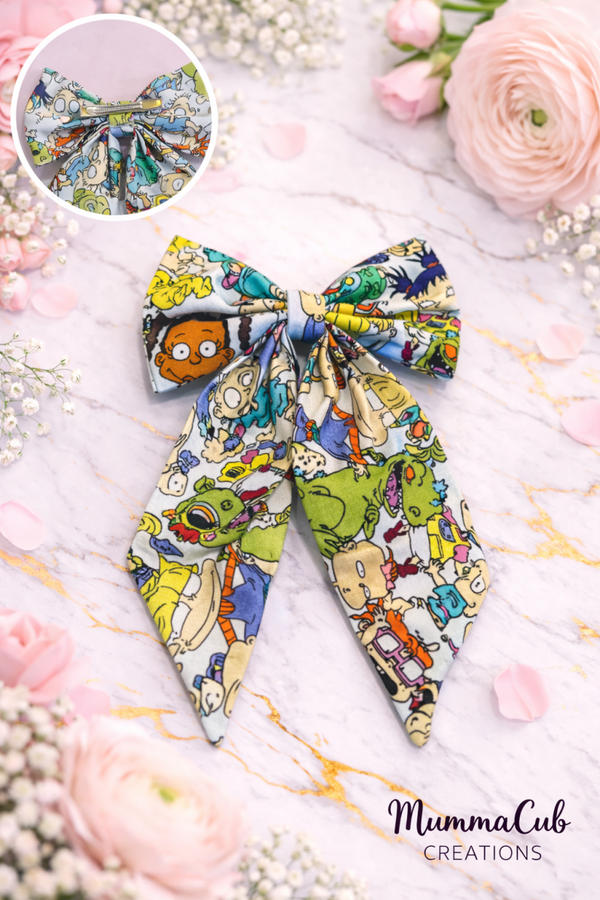 Large 90's Baby Cartoon on White Hair Bow