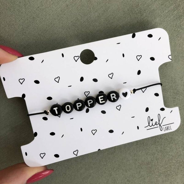 Armbandje zwart: Topper