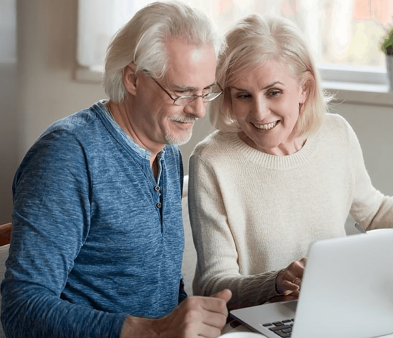 Retired couple enjoying French Conversation lessons with French Online Tutor.