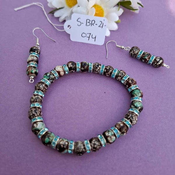 Armband en oorbellen. S-BR-ZI-074