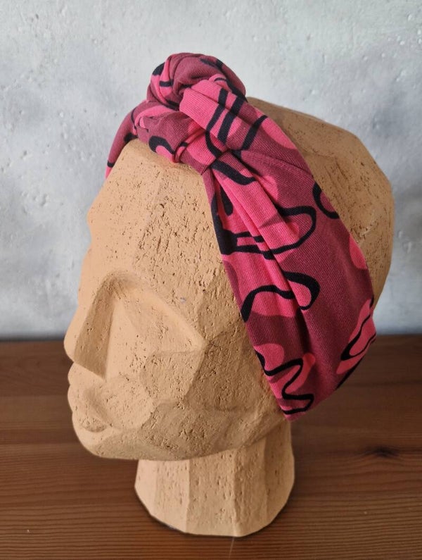 Iambec haarband- wear it the way you like it