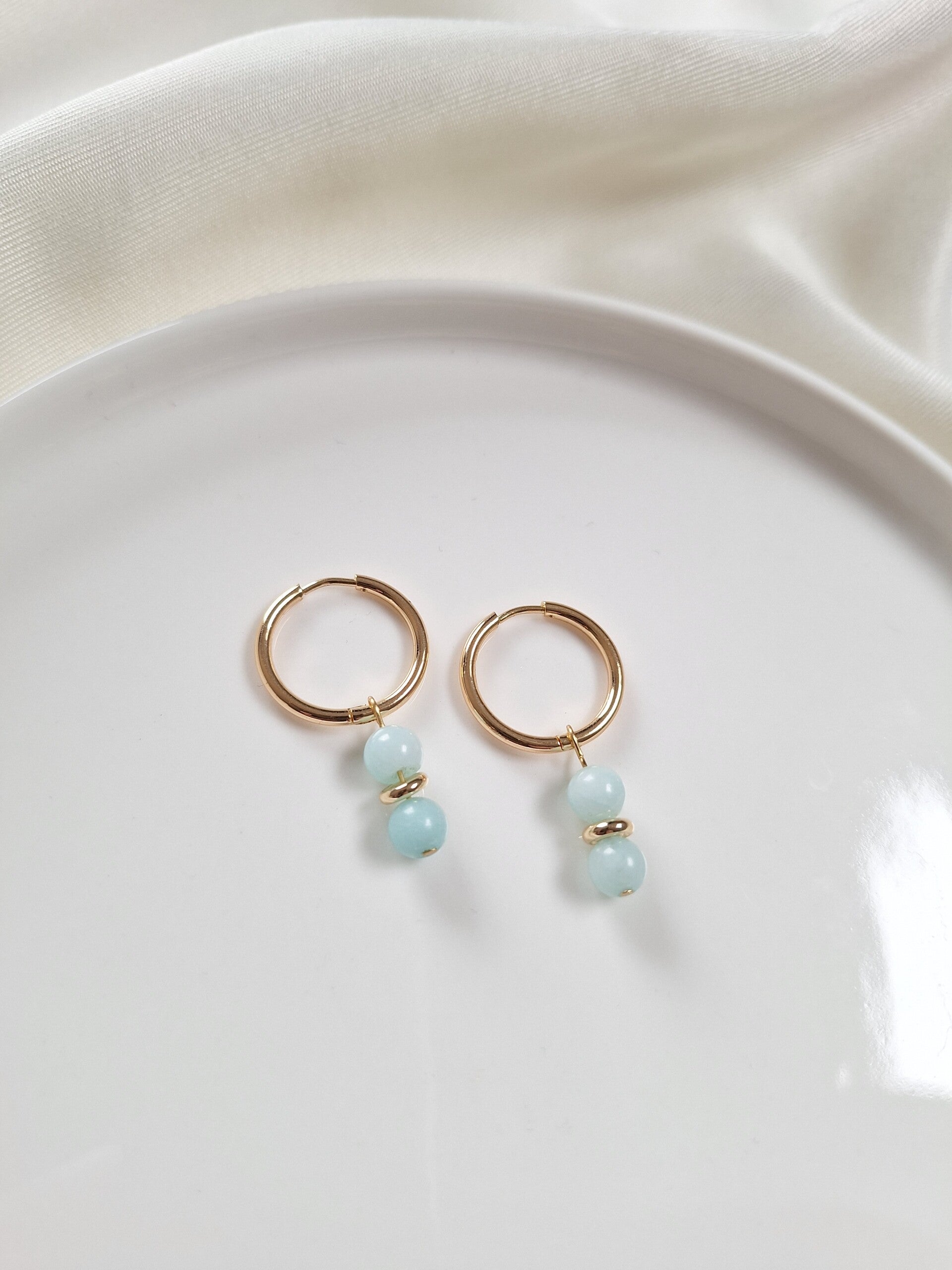 RVS oorbellen goudkleurig, blauw/groen