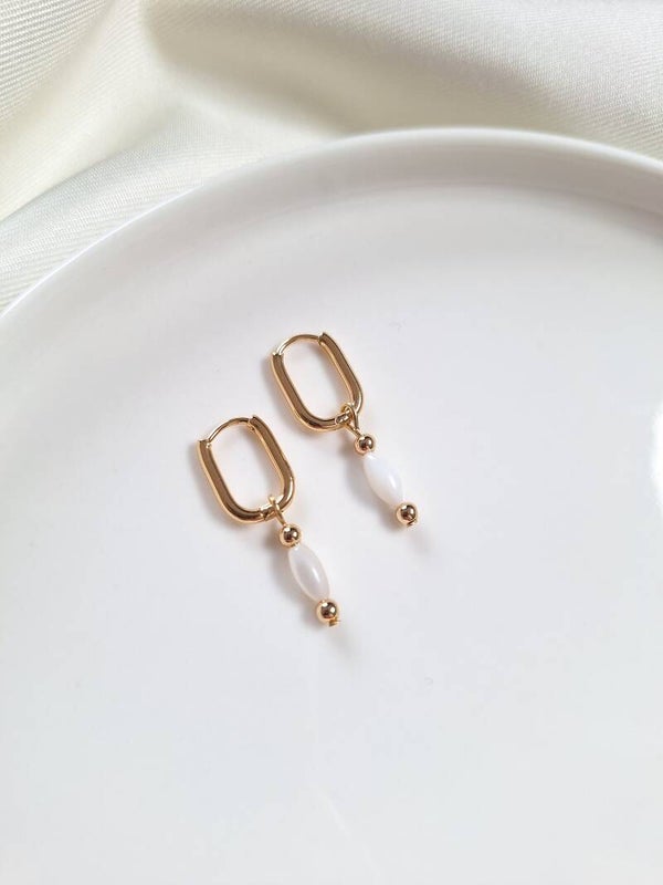 RVS oorbellen goudkleurig, schelp