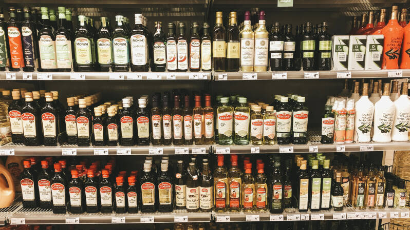 supermarktschap met olijfolie | Olicious