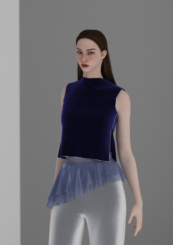 Top leggero abbinato a un corpetto con aperture laterali