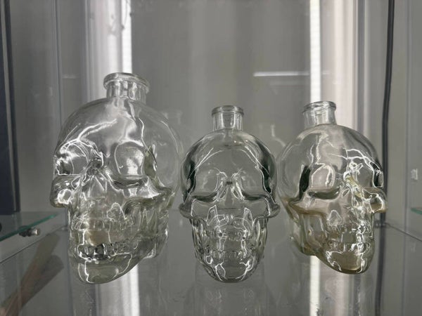 Gllass skull bottles large