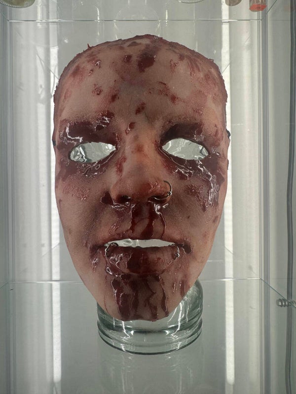 human specimen - artisan made human face masks