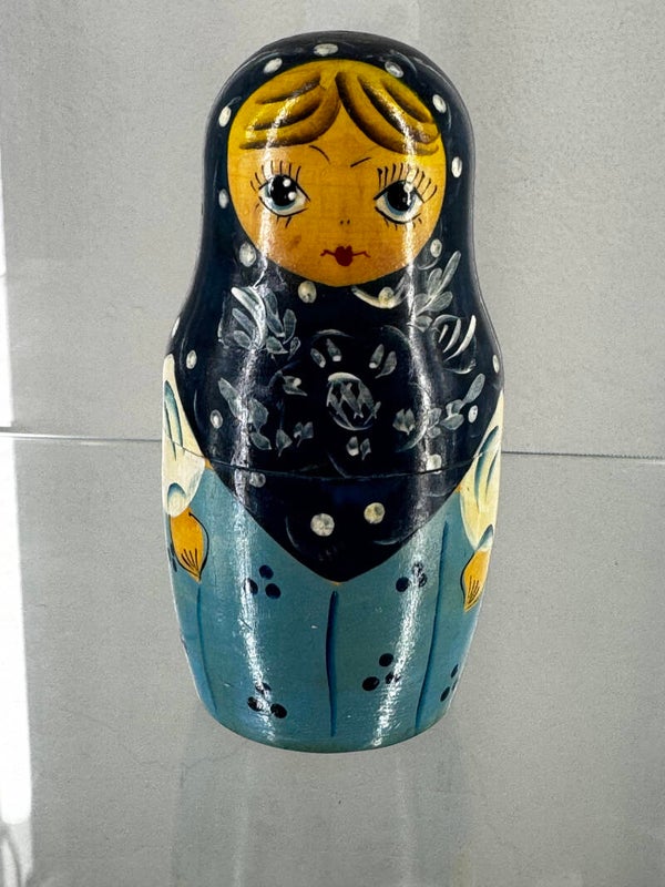 Large Russian doll with tiny dolls inside $60