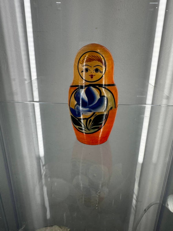 Small russian doll with tiny dolls inside $40